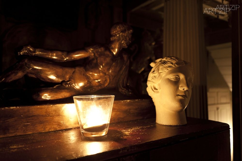 The Colonnade by candlelight. Photograph- Lewis Bush